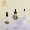 En stock: Botella transparente pequeña en forma de bombilla de 30 ml, Botella dispensadora de vidrio para cosméticos de 50 ml, Botella redonda para sérum de 75 ml