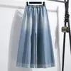 Foto real de jeans retos vintage de mola para tamanhos grandes femininos, design solto estilo americano, calças largas compridas, algodão