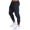 Comercio exterior delgados de primavera y otoño para hombre pantalones deportivos pantalones de running para fitness color liso moda casual pantalones tipo lápiz pantalones de jogging