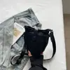 Bolso tipo cubo casual transfronterizo para mujer, nuevo bolso tote diario de gran capacidad para estudiantes, versátil bolso de hombro y cruzado para el trabajo