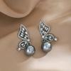 Pendientes de perlas de alta gama, sencillos, ligeros y de lujo, de estilo coreano con aguja plateada y diseño de nicho, con alas asimétricas y diamantes.