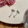 Novos brincos de tarraxa com laço da moda 2023 para mulheres Agulha de prata 925 Clipe de orelha de design nicho com incrustação de diamante Joias de alta qualidade