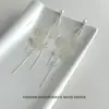 Brincos Longos Super Fada Retrô Nicho com Pérola Concha e Franja para Mulheres Novo Estilo Joia de Orelha de Alta Qualidade Estilosa e Elegante para Mulheres