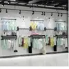 Perchero de hierro forjado para tienda de ropa, expositor de pie, colgador lateral de pared, estante para ropa de hombre, mujer y niño, perchero de pared en la pared