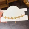 Pulsera para Mujer de Oro Real de 18k Electrochapado con Circonia Europea y Americana, Estrella Hueca, Personalidad de Moda, Nicho, Elegante, Sensación de Alta Gama