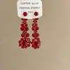 Pendientes Festivos Rojos Atmosféricos Esmalte Goteo de Aceite Flock Adorno de Lazo Pendientes de Perla Nicho Novia Pendientes Xiuhe