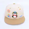 Lindo Sombrero de Pingüino Pequeño para Niños Sombrero de Béisbol de Dibujos Animados de Comercio Exterior para Bebés Sombrero Nuevo de Ala Plana Hip-Hop para Niños de Primavera y Otoño