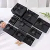 Venta al por mayor de cajas de regalo negras de alta gama con tapa y base, con un lazo decorativo, adecuadas para recuerdos y regalos; Cajas de regalo personalizadas disponibles