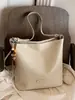 Bolso de hombro de diseño de nicho estilo coreano transfronterizo, moda retro para el día a día, para mujer, color liso, moderno, casual, bandolera tipo cubo
