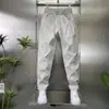 Pantalones casuales deportivos de exterior para hombre, de marca moderna, elegantes, de alta gama, para primavera-verano, a la moda y versátiles, corte recto ajustado
