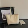 Nueva bolsa de hombro retro minimalista 2026 para mujer, gran capacidad, casual, para ir al trabajo, bolso de mano con textura tejida