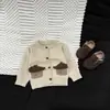Suéter de punto de otoño estilo coreano para niños, nuevo y elegante suéter suave de jacquard para bebés, abrigo versátil de primavera y otoño para bebés