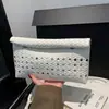 Bolso tejido hueco de moda para mujer, nuevo modelo 2026, monedero de gran capacidad, bolso de mano de moda, bolso tipo sobre único