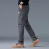 Jeans casuales de alta gama estilo americano de alta calle, ajustados, multibolsillos, para comercio exterior transfronterizo, disponibles en cuatro colores 2026