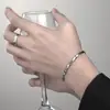 Pulseira Anel de Mobius em Aço Titânio Hip-hop Elegante Nova Corrente Torcida em Haste de Aço Titânio Nova Corrente de Semente de Melão