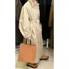Estilo de Luxo Primavera e Outono 2026 Super Estiloso Minimalista Elegante Estilo Preguiçoso Cor Sólida Casaco Trench Longo com Gola Alta para Mulheres