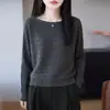 Ropa de punto para mujer 26º Otoño e Invierno Nuevo Estilo Sencillo Cuello Redondo Manga Larga Color Sólido Diseño Hueco Suéter Holgado Camiseta Base