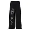 Pantalones casuales de pierna recta con cintura elástica y cordón, estampado de letras en bloques de color estilo americano, marca de moda unisex, pantalones de chándal amarillos de pierna ancha para jazz y street dance