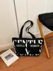 Nuevo bolso de hombro de nicho para mujer, bolso tote casual de gran capacidad, bolso de axila moderno y versátil, bolso de mano estilo coreano