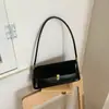 Bolso retro de alta gama para mujer, nueva colección otoño/invierno 2026, moderno bolso de hombro Melard, bolso tipo baguette estilo coreano