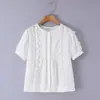 Atacado Verão 2026 Novos Produtos Estilo Europeu e Americano Feminino Branco Algodão Renda Patchwork Manga Curta Camisa 25157
