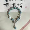 Pulsera de cerámica con hoja de ginkgo nueva pulsera de borla retro china pulsera personalizada para hombre y mujer puesto transmisión en vivo suministro de fábrica