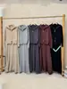Nuevo Conjunto de Dos Piezas para Mujer Otoño/Invierno 2026: Cárdigan de Punto con Cuello Solapa y Doble Cremallera + Falda de Cintura Alta Estilo Casual