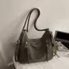 Nueva mochila retro 2026 para mujer, colección otoño/invierno, con un diseño lindo y elegante, gran capacidad, bolso de hombro casual y un bolso tote moderno y minimalista