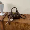 Bolsa tote casual e estilosa, nova coleção outono de 2026, bolsa de ombro estilo Boston de grande capacidade para trabalho e deslocamento