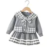 Conjunto de Suéter para Niña 2026 Primavera, Otoño e Invierno Nuevo Elegante de Punto a Cuadros Falda Plisada Conjunto de Dos Piezas para Niños