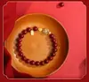 Venta al por mayor de fábrica pulsera de cinabrio natural arena dorada púrpura tarjeta de la suerte pulsera de cuentas de la suerte TikTok mano rápida Comercio electrónico entrega de una sola pieza