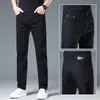 Pantalones Vaqueros Finos de Tencel Estilo Verano Hong Kong para Hombre 2026 Nuevo Corte Ajustado Estilo Coreano Elásticos Rectos Casual de Negocios