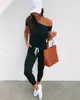 2022 nuevo transfronterizo primavera/verano ropa de mujer ebay Amazon venta caliente hombro descubierto manga corta bolsillo encaje hombro con cordones mono