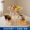 Soporte de exhibición redondo transparente de acrílico con luz LED para postres y pasteles horneados, soporte redondo de cuatro niveles con bandeja para aperitivos