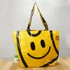 Venda Direta de Fábrica de Sacolas de Tecido PP com Rosto Sorridente e Logo Personalizado para Compras e Promoção, Sacolas Dobráveis de Grande Capacidade Feitas Sob Medida