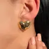 Accesorios transfronterizos europeos y americanos: Pendientes sencillos y elegantes estilo ins de flor y corazón, versátiles pendientes metálicos de estrella de mar lisa de lava