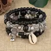 Pulseira Multicamadas Criativa com Pingente de Concha Retrô Conjunto de 4 Peças Estilo Resort Litorâneo Boêmia Pulseira Elástica para Mulheres