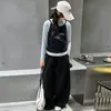 Conjunto de Dos Piezas de Otoño para Niñas 2026 Nuevo Influencer Infantil Tirantes Espagueti Falso Dos Piezas Camiseta Pantalones de Pierna Ancha Conjunto Primavera/Otoño