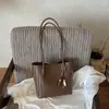 Bolso de mano tejido de patrón de nicho estilo coreano ins, bolso cesta de moda de gran capacidad, bolso de hombro y axila texturizado de moda