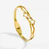 Fábrica en stock al por mayor moda coreana personalidad simple titanio mariposa pulsera hebilla de resorte diseño chapado 18k
