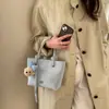 Bolso de Cubo de Mano Nuevo Estilo Primavera 2026 Transfronterizo para Mujer, Bolso de Hombro Casual de Moda Tendencia con un Toque de Lujo, Bolso Cruzado