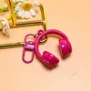 Nuevo llavero creativo de auriculares 3D, un accesorio moderno y genial para bolsos, joyería hecha a mano para manualidades y materiales para accesorios, al por mayor