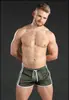 Shorts Masculino Musculoso Secagem Rápida Buraco Sexy Respirável Esportes Praia Treinamento Fitness Lazer Ao Ar Livre Calças de Três Pontos para Homem