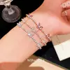 Pulsera Colgante Mariposa de Circonita Super Brillante Lujo Ligero Moda de Alta Gama Exquisito Anillo de Mano Dulce Versátil Nicho Joyería de Mano para Mujeres
