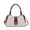 Bolsa feminina de nicho de moda de alta qualidade, bolsa de mão estilosa com blocos de cor personalizados, bolsa de ombro único transversal elegante para mulheres