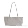 Bolso tote de gamuza vintage para mujer, nuevo modelo de otoño 2026, bolso de hombro de gran capacidad para el trabajo, bolso de mano de alta gama para mujer