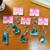 Llavero creativo de botella a la deriva rellena de aceite con animales marinos, lindo colgante de arena movediza líquida, accesorio para bolso, pequeño regalo