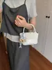 Bolso de mano pequeño para mujer de moda transfronterizo 2026 otoño nuevo bolso bandolera texturizado bolso de hombro casual versátil para el día a día