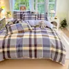 Juego de cama de cuatro piezas de algodón lavado fresco pequeño grueso para lijar funda nórdica funda de almohada ropa de cama de tres piezas para dormitorio de estudiantes