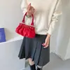 Bolso nube de gamuza con lazo estilo coreano de nicho para mujer, nuevo de moda verano 2026, bolso pequeño de hombro y cruzado para el día a día